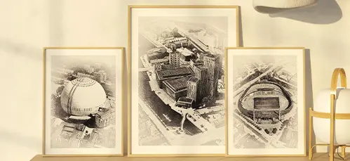 Posters med fågelperspektiv över städer och betydelse fulla byggnader.